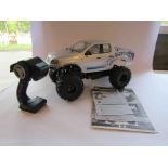 A Tamiya kit built radio controlled Volkswagen Amarok Custom Lift with Tactic remote control,