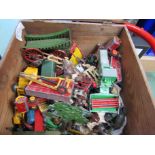 A quantity of lead farm animals and figures and playworn diecast agricultural vehicles