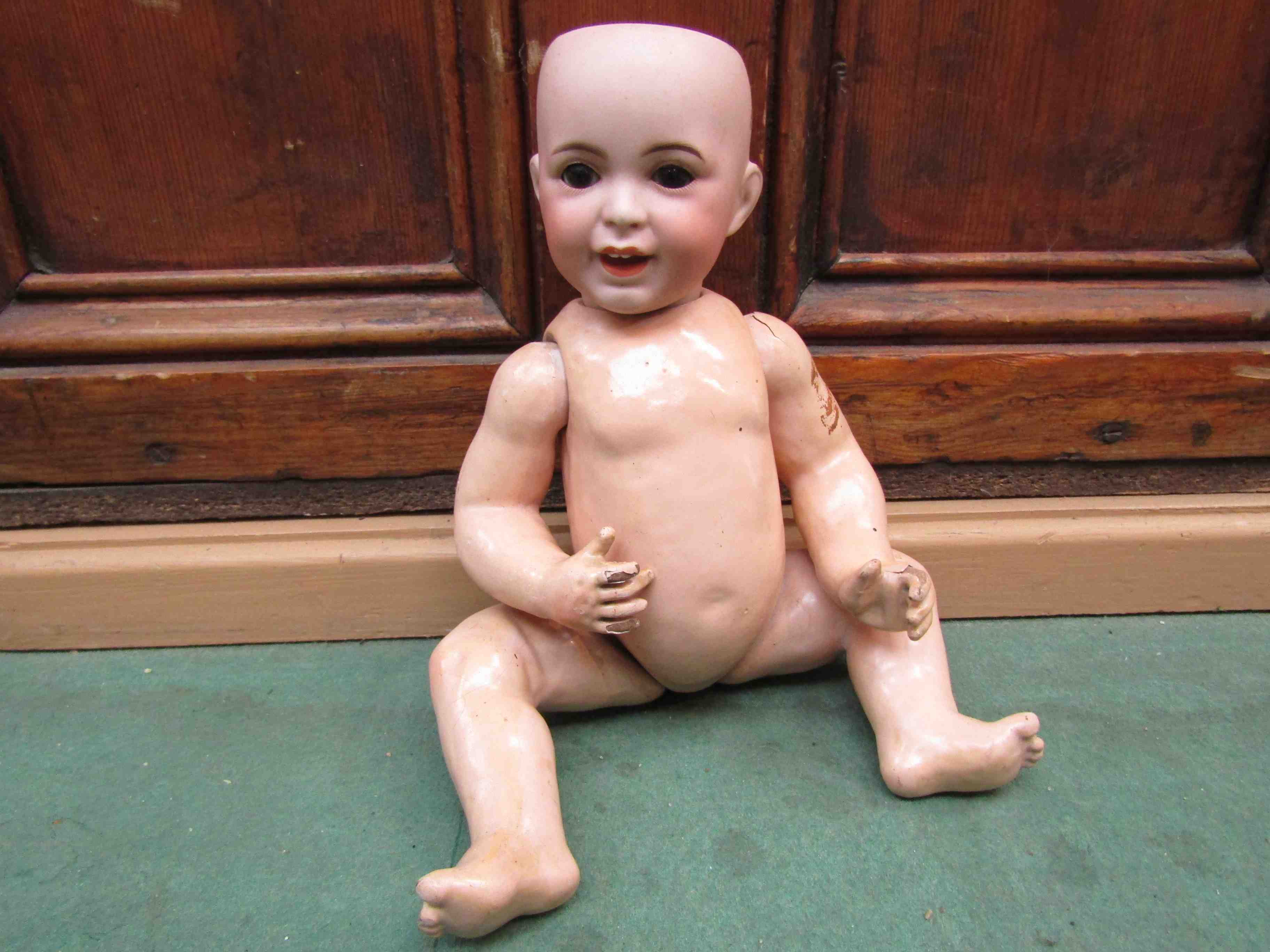 An S.F.B.J, Paris 236 bisque head doll on jointed composition body, approx.