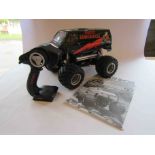 A Tamiya kit built 1:12 scale radio controlled Lunch Box Customized Monster Van with Tactic remote