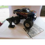 A Tamiya kit built radio controlled Super Clod Buster pick up truck with A.F.H.D.