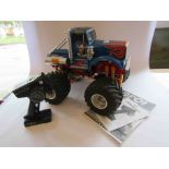 A Tamiya kit built 1:10 scale radio controlled Bullhead Customized Monster Truck with Absima