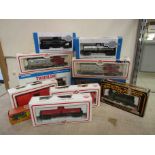 Five boxed H0/00 gauge locomotives including Mainline, Bachmann,