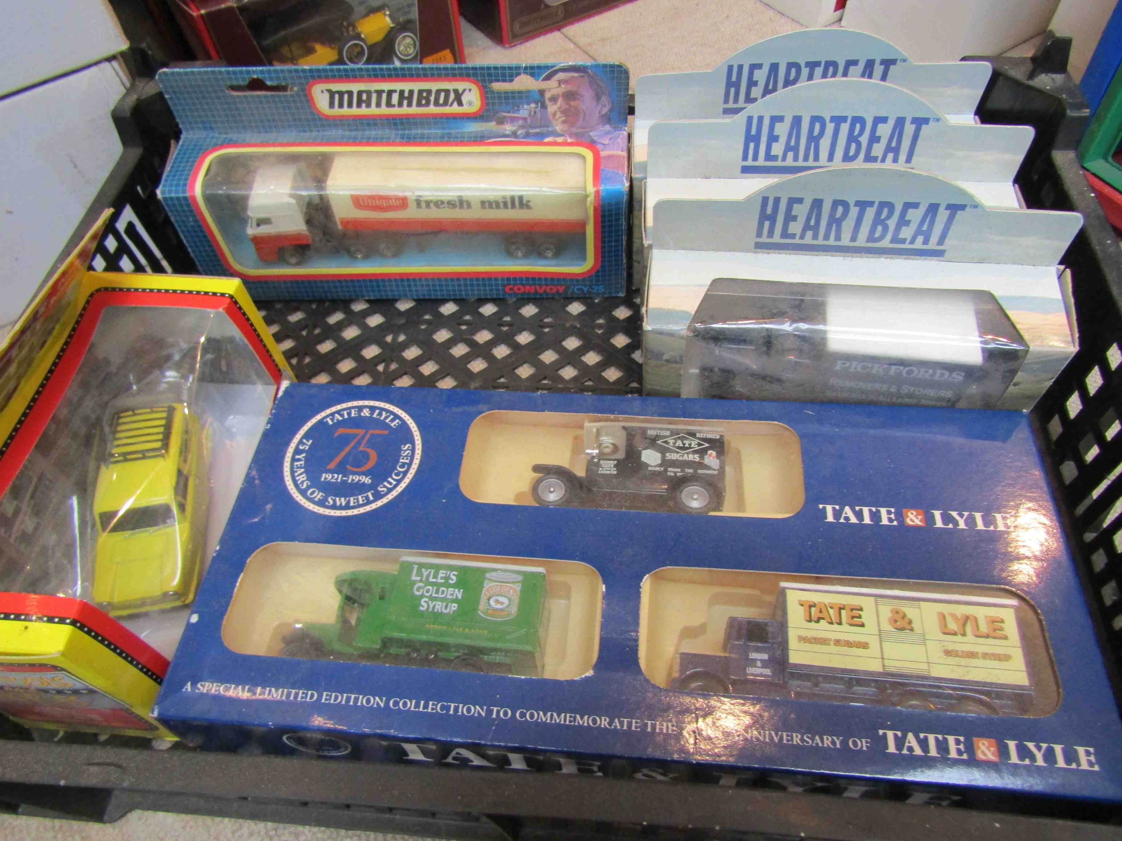 Six assorted boxed diecast vehicles including Lledo 'Only Fools and Horses' and 'Heartbeat'