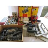 A collection of Trix Twin Railway 00 gauge items including three locomotives, various rolling stock,
