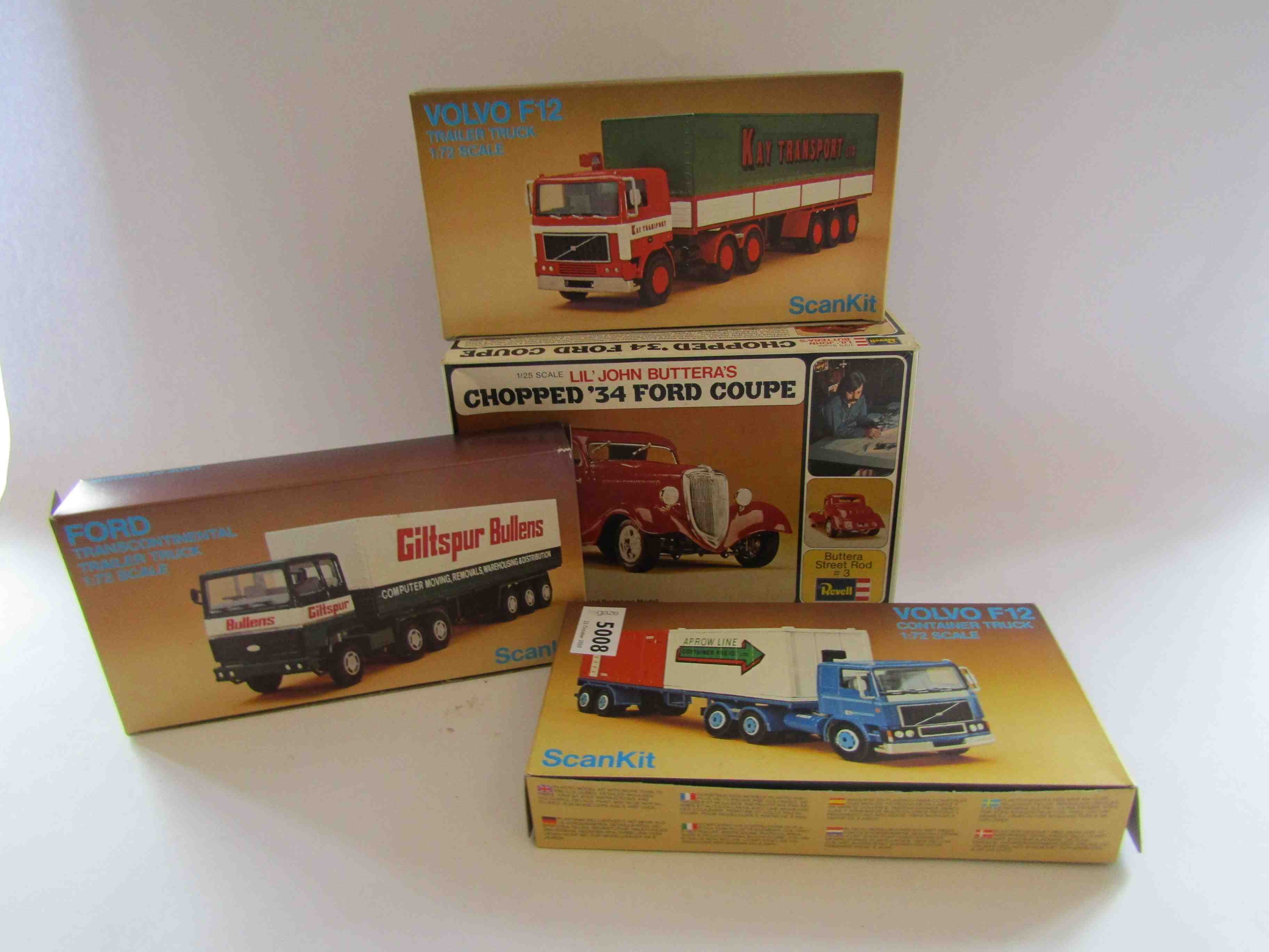 Three Scankit 1:72 scale truck plastic model kits and a Revell 1:25 scale Chopped '34 Ford Coupe