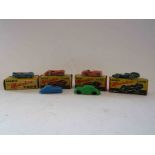 Four boxed Empire made Marx Miniature Cars and two other unboxed plastic model cars (6)