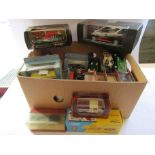 Mixed boxed and loose diecast vehicles including 1:18 scale Mercedes Benz A-Class,