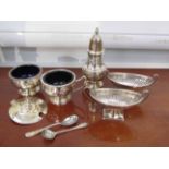 A quantity of silver cruets including a pair of fluted salts, various makers and dates,