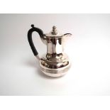 A silver coffee pot, marks rubbed, Sheffield 1930,