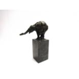 A bronze elephant signed IRWIN on a marble base, 22.