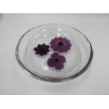 A Daum Glass dish in clear glass with applied amethyst moulded flowers to interior.