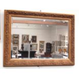 A highly ornate rectangular mirror