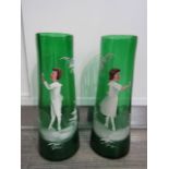 A pair of Mary Gregory style green glass vases of tapering form,