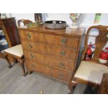 A George III mahogany three drawer chest with ring drop handles, 95cm x 92.5cm x 45.