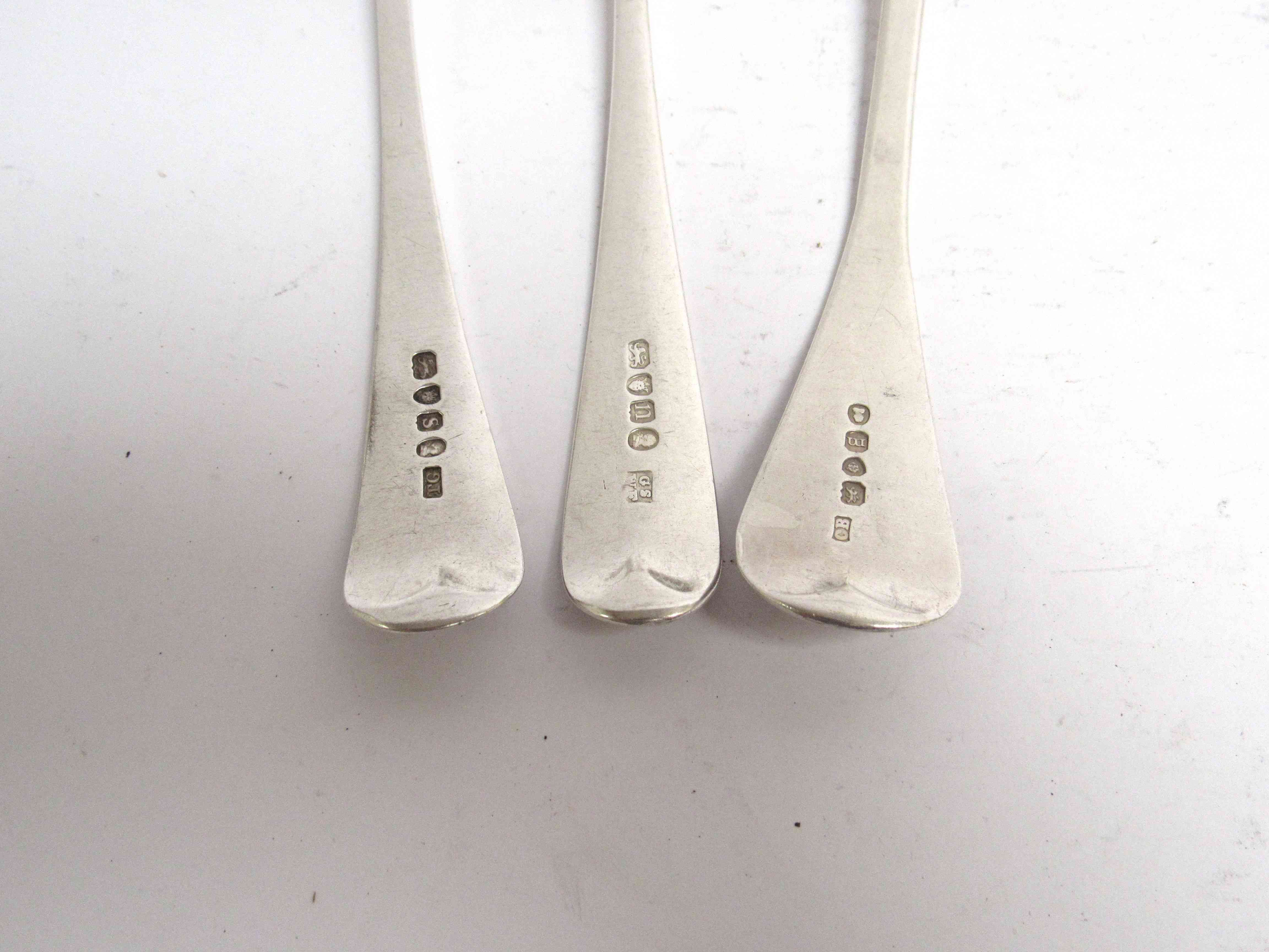 Six various Georgian serving spoons, five with monogrammed handles, - Image 4 of 5