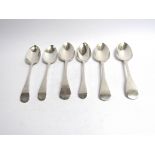 Six various Georgian serving spoons, five with monogrammed handles,