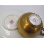A Royal Worcester porcelain miniature teacup and saucer decorated by Stinton
