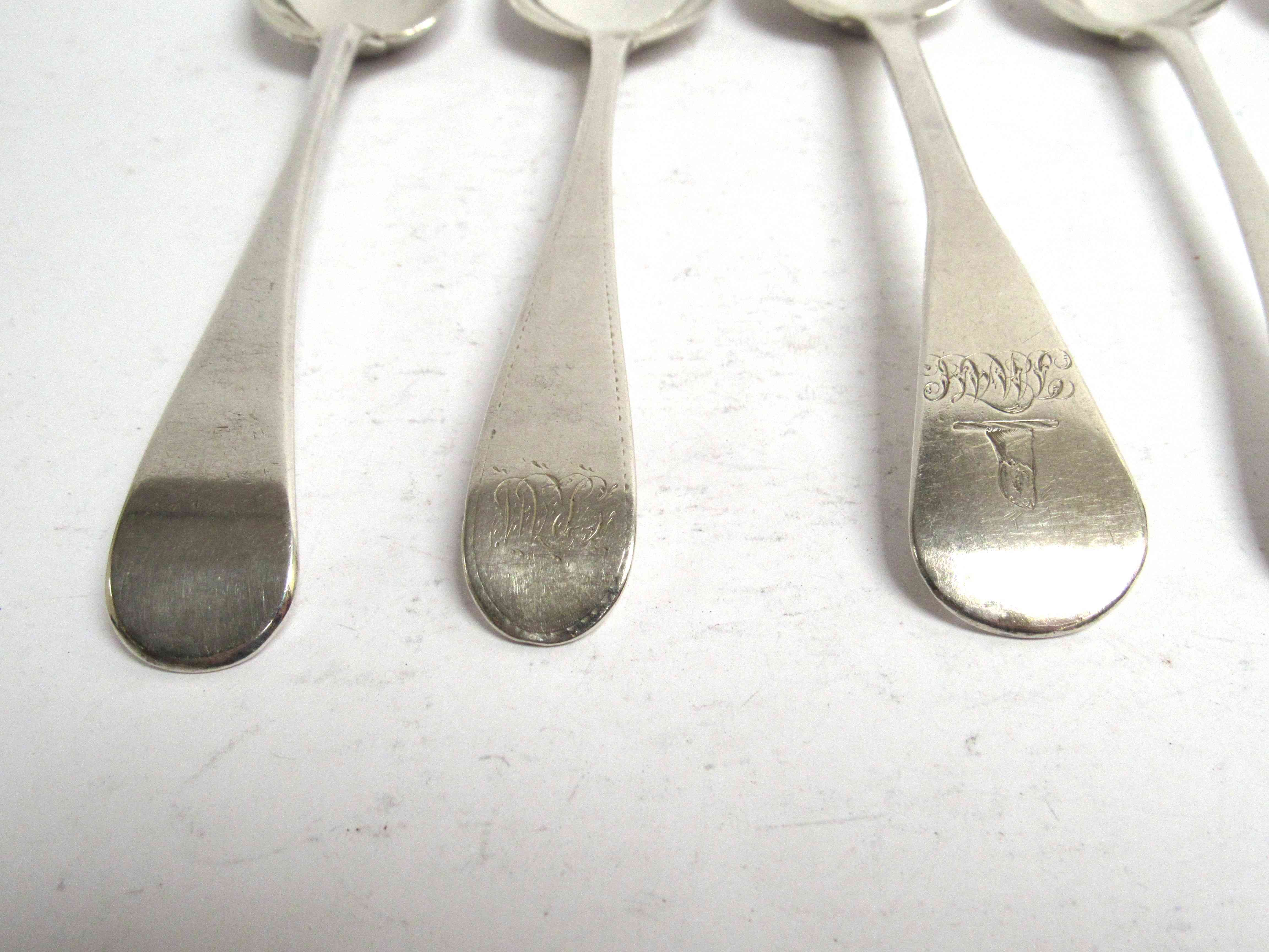 Six various Georgian serving spoons, five with monogrammed handles, - Image 2 of 5