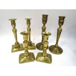 Three pairs of 19th Century brass candlesticks