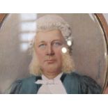 A 19th Century oval miniature on ivory, portrait of a Barrister. Signed Cosway lower right.