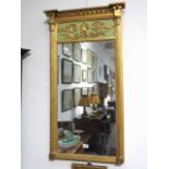 A Regency gilded wall mirror with ball detail and shell/foliage panel