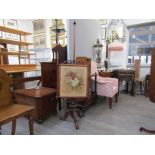 A Victorian pole screen with tapestry panel