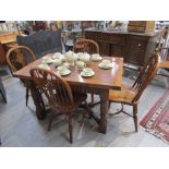 A Titchmarsh & Goodwin circa 1600 style Suffolk farmhouse style oak drawer leaf dining table on 'Y'