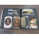 An early 20th Century postcard album with substantial contents