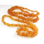 Two Baltic amber rough cut necklaces,