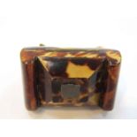 A Georgian tortoiseshell tea caddy form trinket box