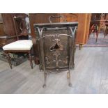 An Art Nouveau copper and wrought iron fire screen, a/f,