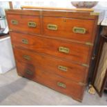 A 19th Century mahogany campaign chest of two short over three long drawers with brass inset