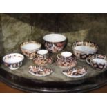 A quantity of Royal Crown Derby Imari items consisting of a pair of cabinet coffee cans and saucers,