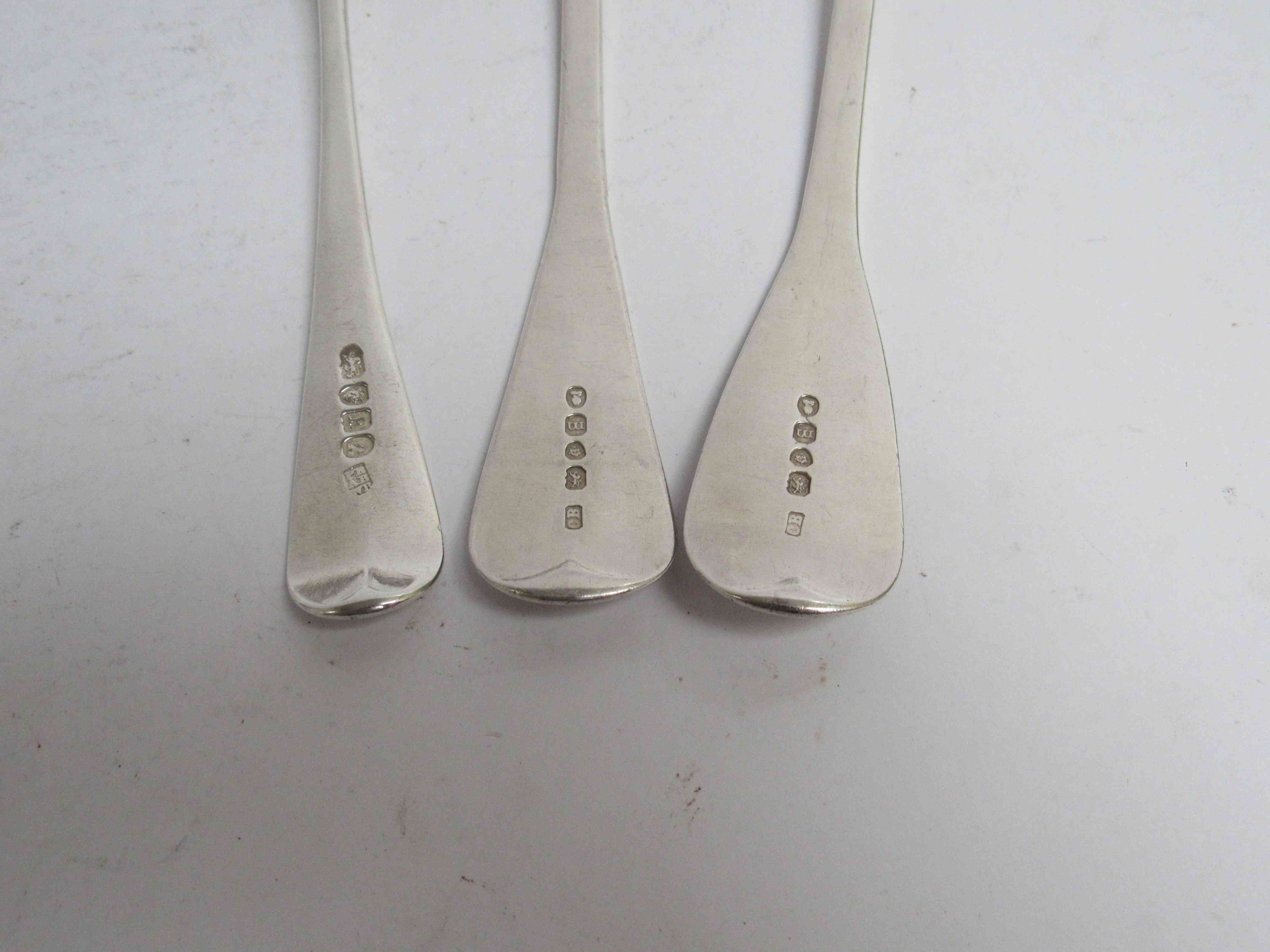 Six various Georgian serving spoons, five with monogrammed handles, - Image 5 of 5
