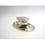 A silver oval inkwell, Birmingham 1921, weighted base, 16.