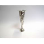 A William Comyns silver stem vase with all over engraved detail, weighted base, London 1892,