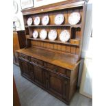 A Titchmarsh & Goodwin 17th Century style oak dresser and rack (RL19855),
