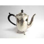 A Mappin & Webb London silver coffee pot with ebony handle and knop, London 1896, engraved front,