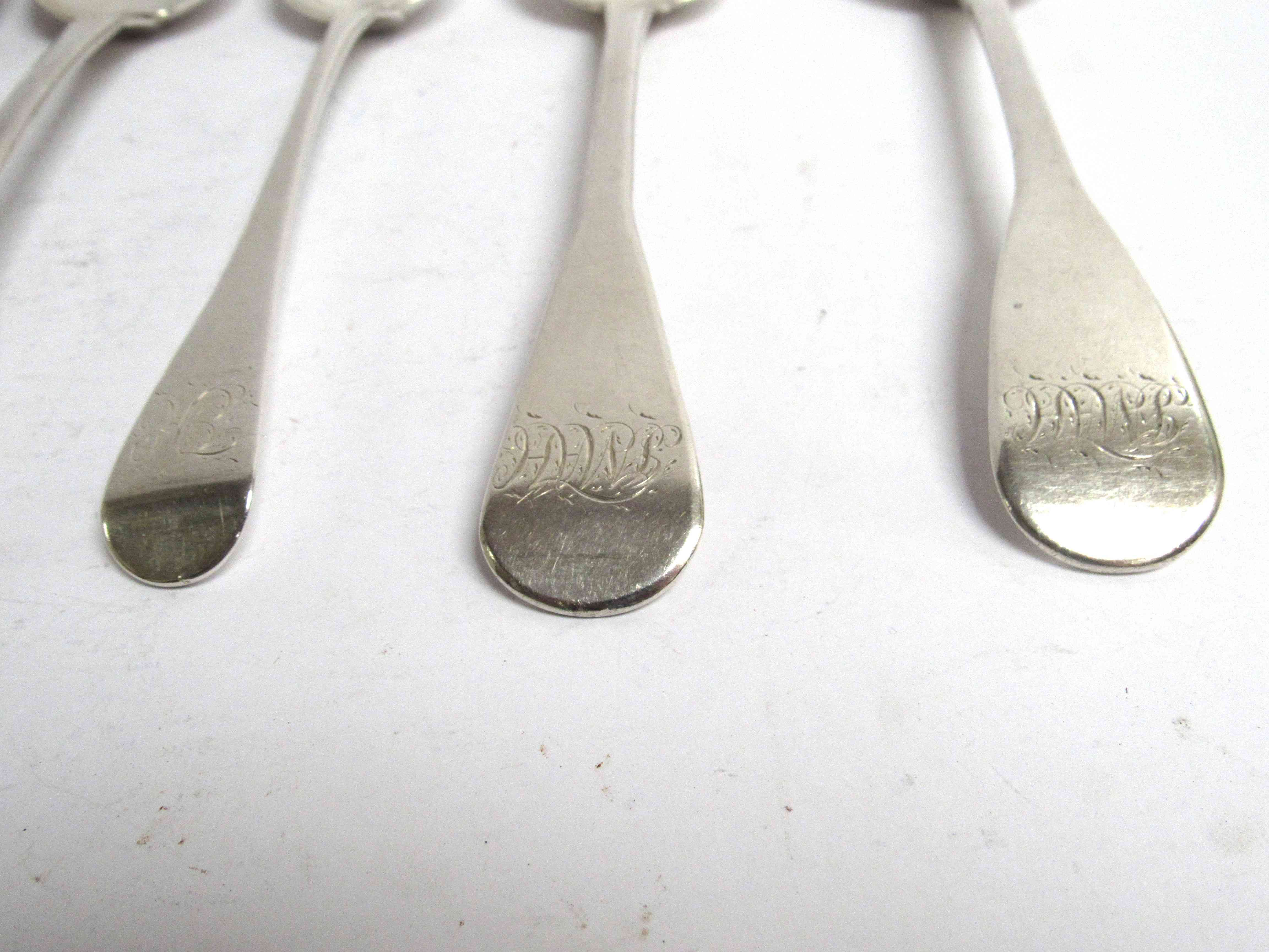 Six various Georgian serving spoons, five with monogrammed handles, - Image 3 of 5