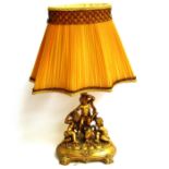 A pair of gilt figural table lamps with water nymphs and sea creature, with shades,