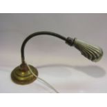 A late 19th/ early 20th Century desk lamp with shell form shade,