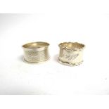 Two silver napkin rings both monogrammed one by William Hutton & Sons, Sheffield 1929,