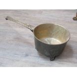 A 19th Century bronze pan on footed base,