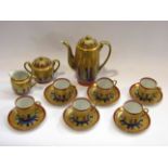 A 20th Century Japanese coffee set with bright lustre glaze