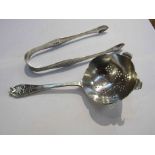 A pair of Georgian silver sugar tongs and an Emile Viner tea strainer, Sheffield 1960,