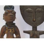 Three Polynesian tribal figures,
