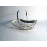 An Edwardian Barker Brothers silver swing handled bread/cake basket, Chester 1908, 23.