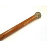 An 18ct gold knopped malacca walking cane, embossed foliate design,