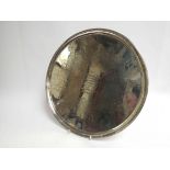 A Robert Sharp silver circular presentation tray relating to Charles Underwood Esq renowned